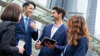 Group of business people working together
