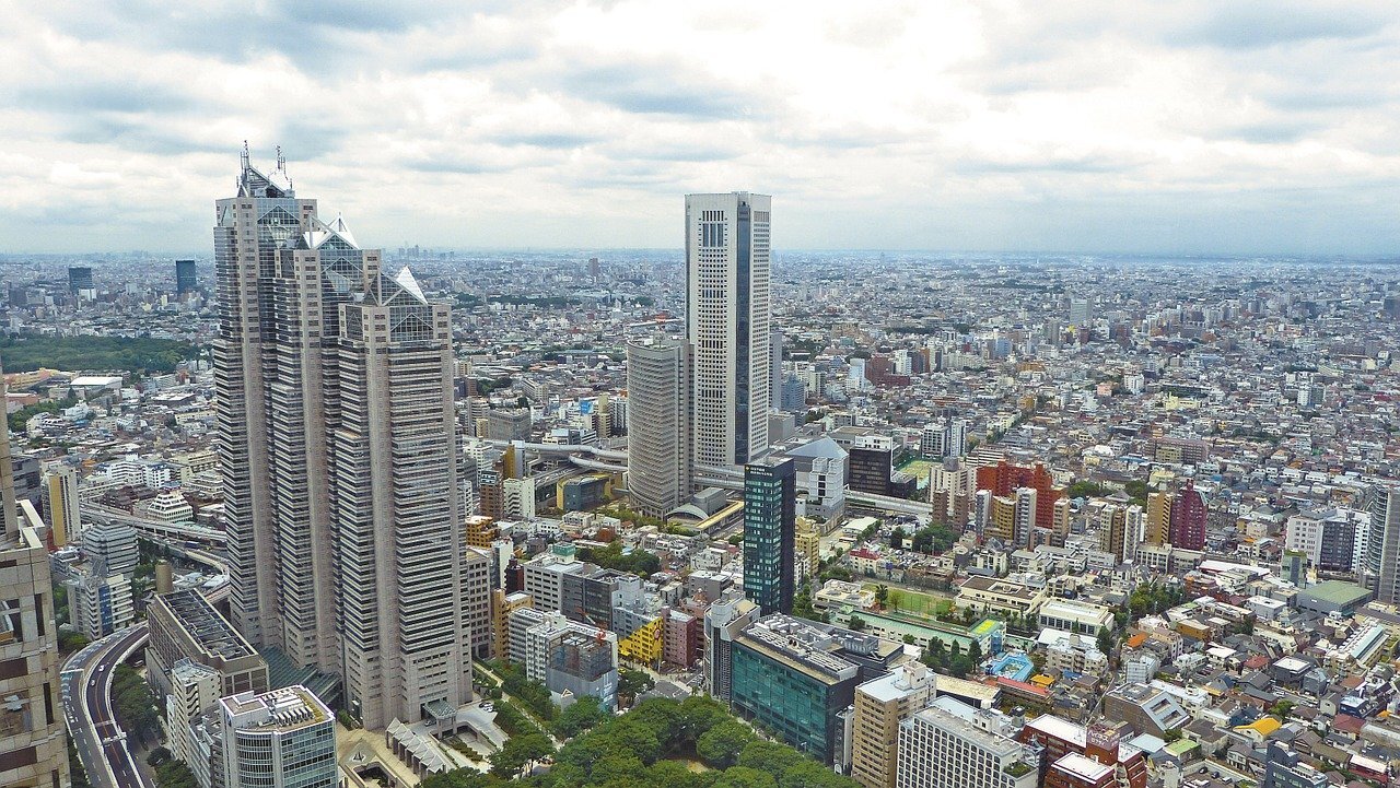 高層ビルの上から映った都市の背景